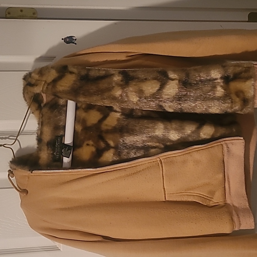 Donna Solyers Tan zip up long sleeve hoddie fur coat.